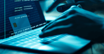 Typist at laptop using cookies while browsing with threat of session hijacking