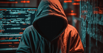 Anonymous hacker representing man-in-the-middle MTM attack 