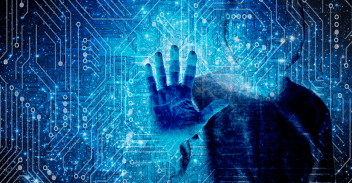 Hand on screen to symbolise phishing for data